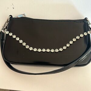 Trendy going out patent leather bag with rhinestone cross detail